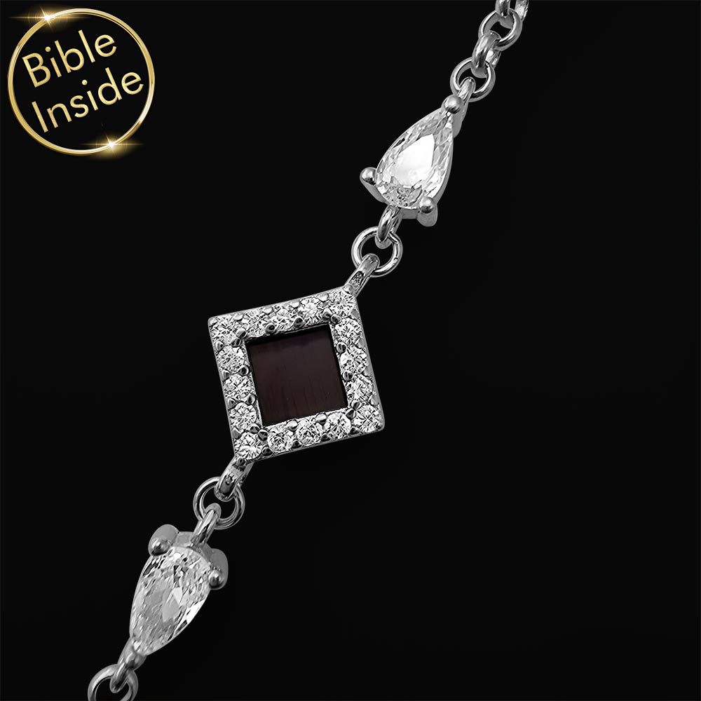 צמיד זהב לבן כתכשיט לבת מצווה עם מעוין נוצץ וננו תנ"ך